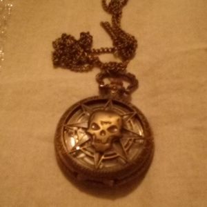 Skulls head pocket watch with 30 inch chain